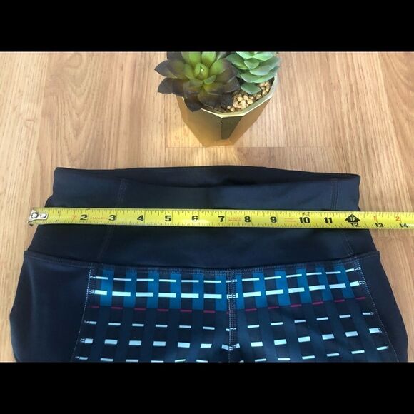 ATHLETA Blue Mesh Geometric Multicolor Zipped Side Pockets Capri Leggings - Picture 2 of 8